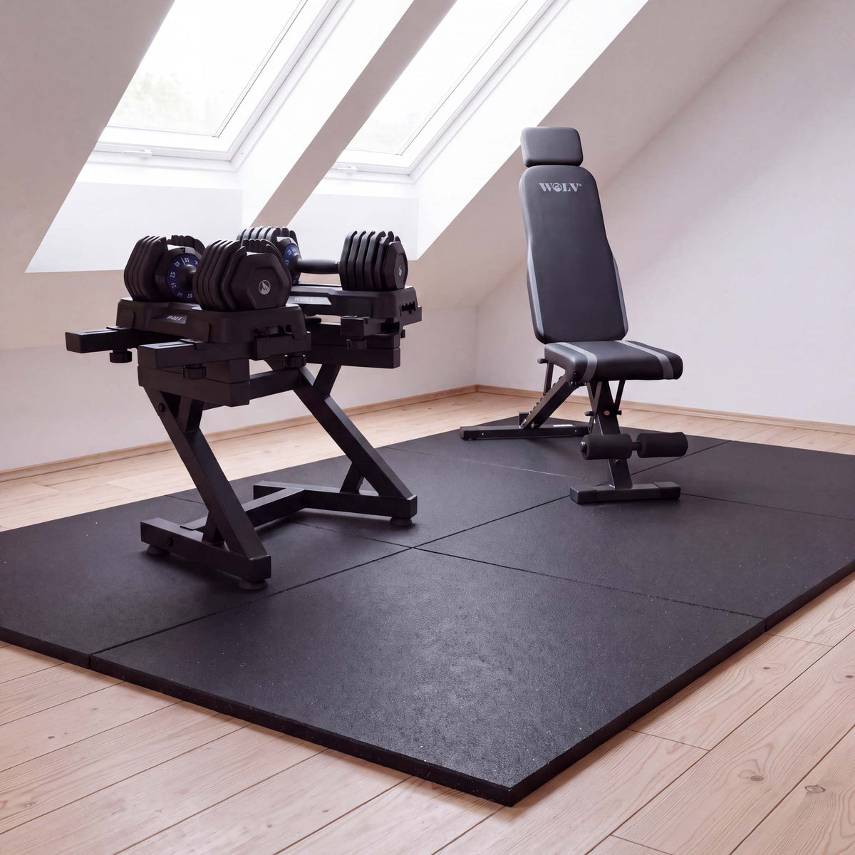 WOLV Home Gym Setup B with 25 kg dumbbells in an attic home gym