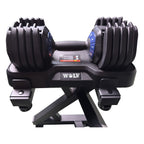 Een 25 kg dumbbell frontaal in zijn WOLV tray boven op het rack, blauwe draaiknoppen naast de rubberen grip