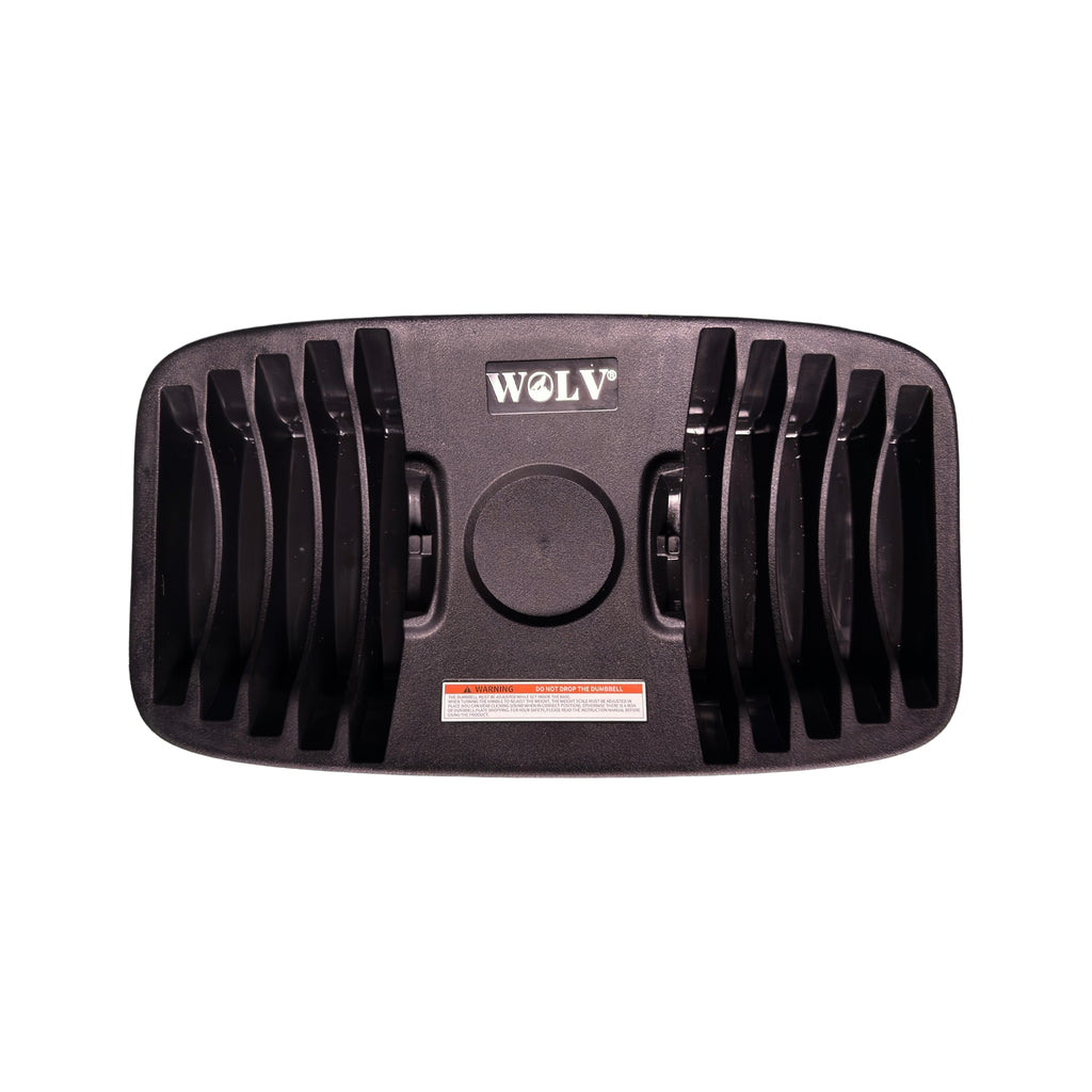 Overhead view of the empty WOLV base tray with plate slots for the adjustable dumbbell 40 kg