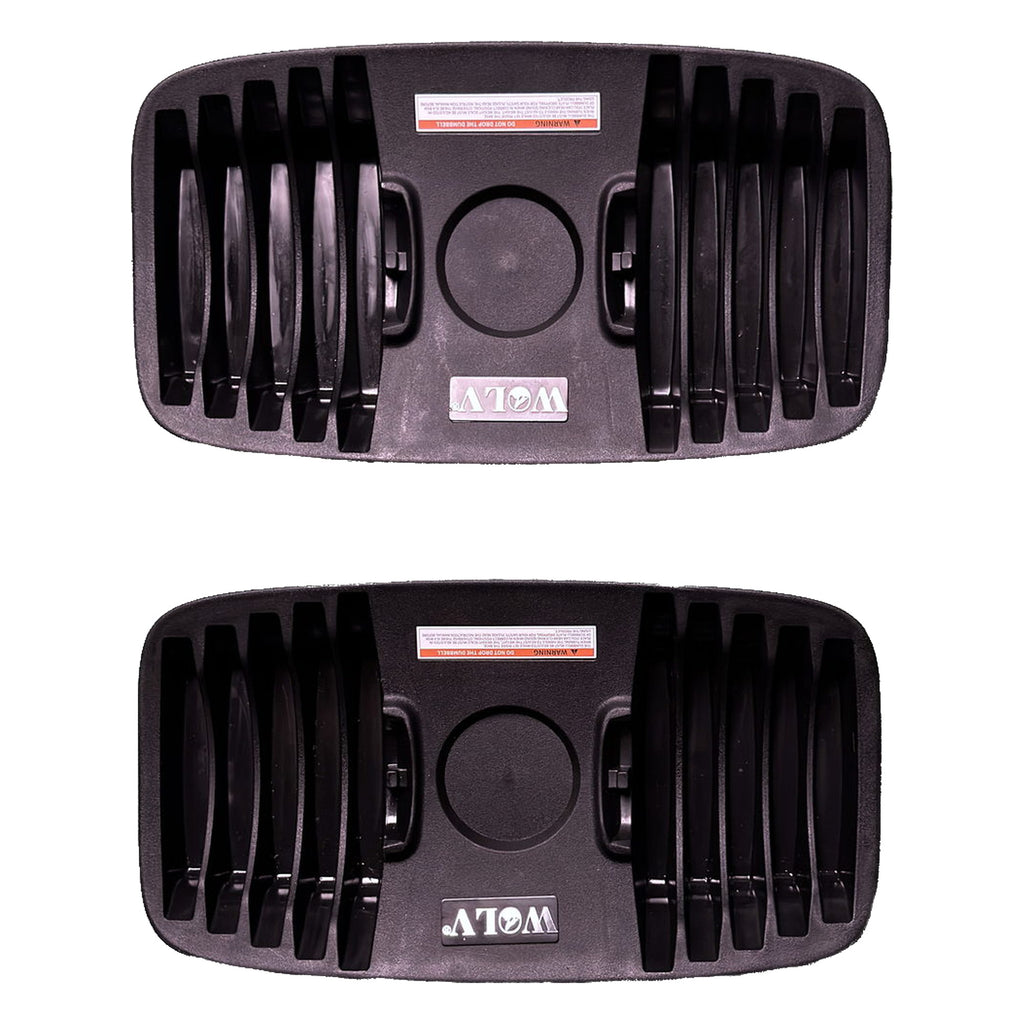 Top-down view of the two WOLV base trays showing moulded plate slots and warning labels