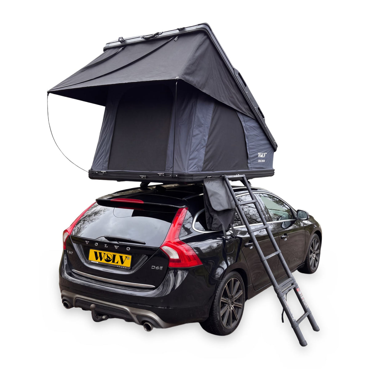 WOLV Hardcase Rooftop Tent opened on a black estate car with telescopic ladder and awning