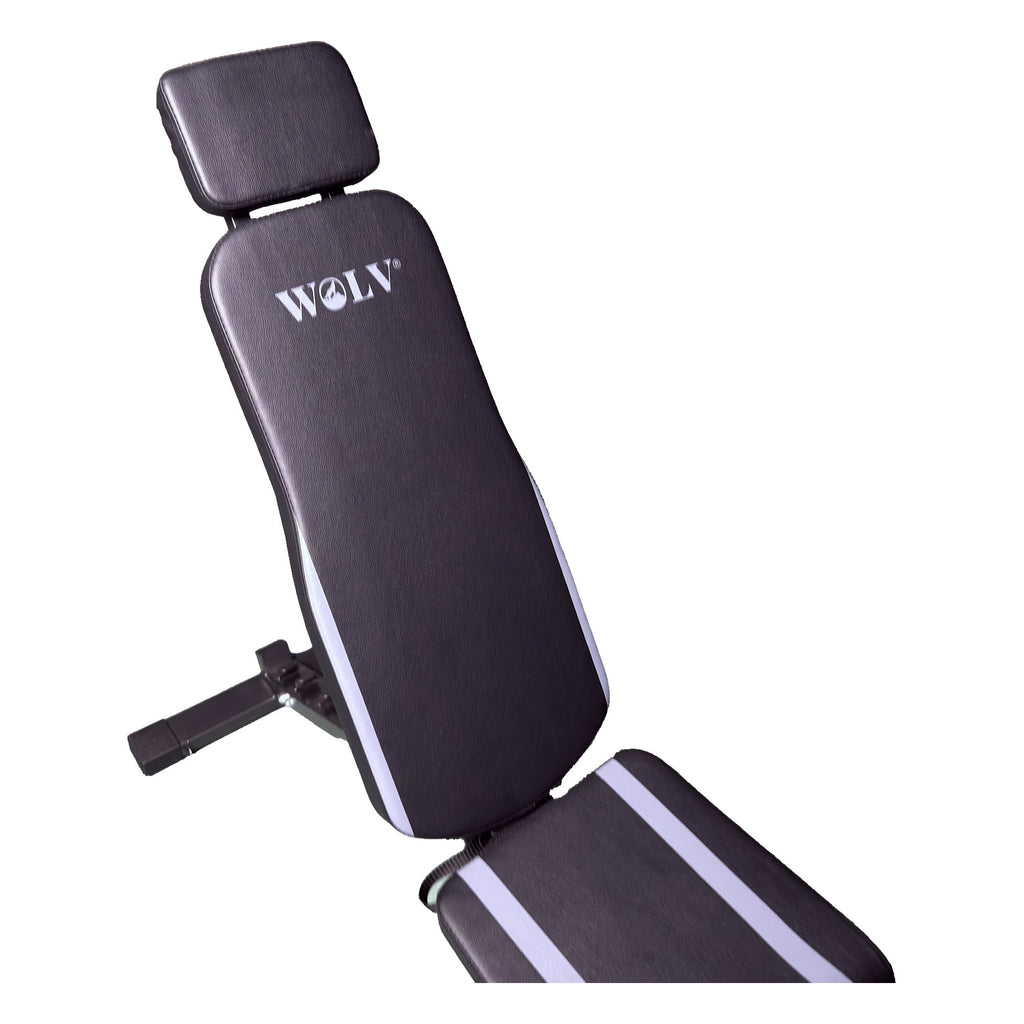 Close-up from above of the WOLV-branded backrest pad and headrest cushion on the Bastion bench