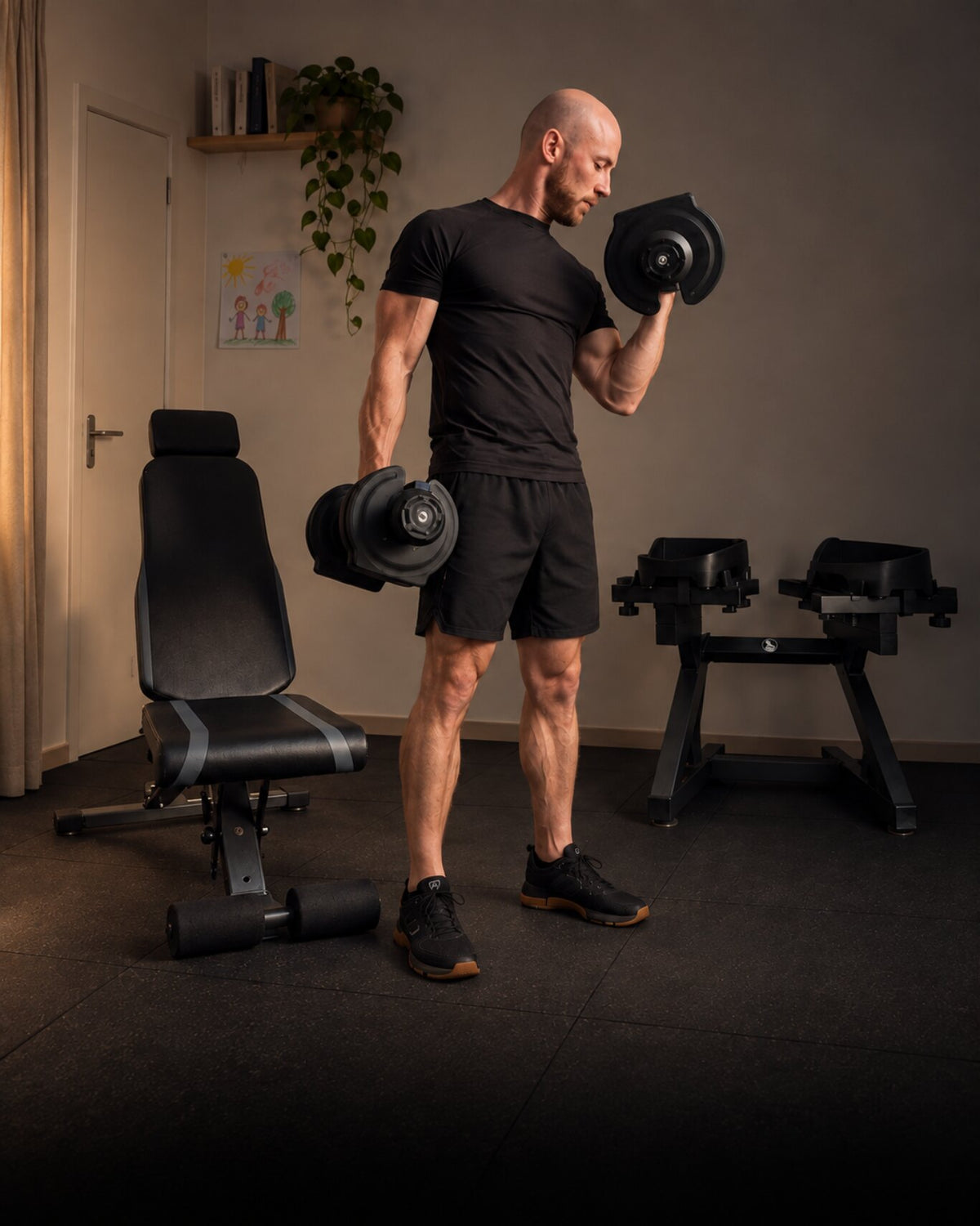 Man training with WOLV adjustable dumbbells in a living room home gym at dusk, portrait crop for phones