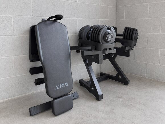 WOLV Home Gym Setup A: folded adjustable bench and dumbbell stand with adjustable dumbbells
